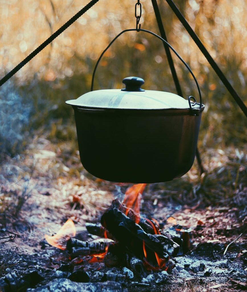 campfire dutch oven on tripod rack